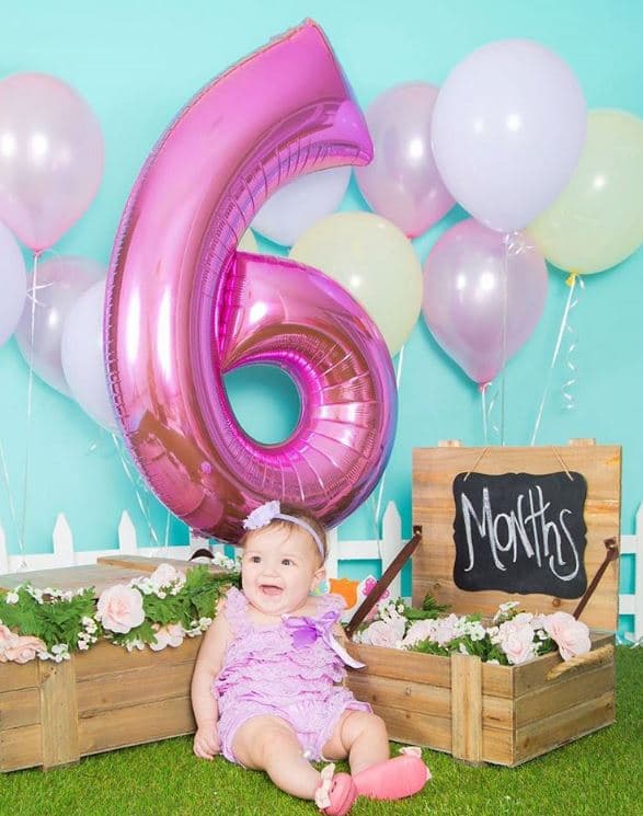 El tiempo vuela. Toda redondita para comérsela a sus seis meses de nacida.