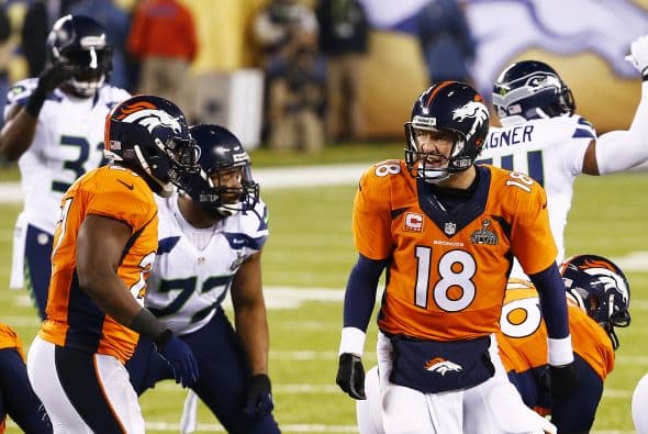 Los Seahawks, con un fútbol "total", el que había trabajado el entrenador del equipo durante toda la temporada regular, el veterano Pete Carroll, derrotaron por paliza de 43-8 a los Broncos, la mejor ofensiva de liga, con el mariscal de campo Peyton Manning a la cabeza. No habían pasado ni 12 segundos desde el comienzo del partido y los Seahawks ya hicieron historia con la anotación más rápida que se había dado jamás en un Super Bowl. Pero lo peor no fue el dejarse anotar dos puntos, sino la imagen de enfrentamiento entre Manning y el centro de origen mexicano Manny Ramírez, que no le dio bien al balón, y aunque el corredor Knowshon Moreno lo recuperó, lo hizo en la zona de protección. La mejor ofensiva de la NFL estaba paralizada, sin saber qué hacer, y ahí fue el comienzo y el final del partido disputado en el MetLife Stadium, de East Rutherford (Nueva Jersey), donde la temperatura fue de 43 grados. Malcom Smith recibió el premio de Jugador Más Valioso (MVP), el octavo defensor que lo consigue en un partido de Super Bowl y el tercer apoyador. Carroll, de 61 años, el tercer entrenador con más edad de la NFL que ganó un Super Bowl, se convirtió en el tercer entrenador que logra los dos títulos de campeón universitario de la NCAA con el equipo de USC y ahora los Seahawks en la NFL.