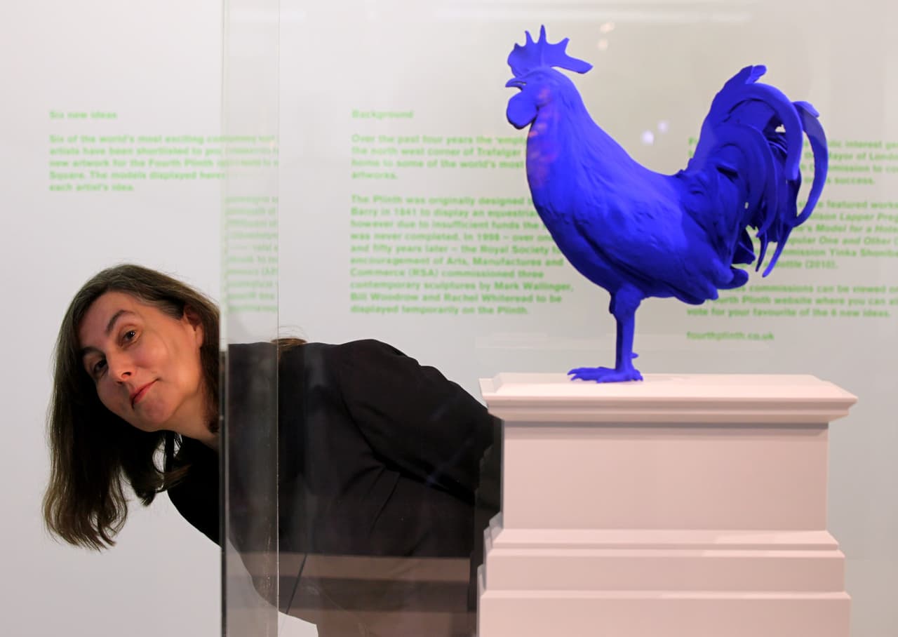 LONDON, ENGLAND - AUGUST 19: Artist Katharina Fritsch poses with a model of her proposed design for the Fourth Plinth in Trafalgar Square entitled 'Hahn/Cock' on August 19, 2010 in London, England. Models of the six shortlisted proposals for the Fourth Plinth commission, which have been unveiled today, have gone on public display in the foyer of St-Martin-in-the-Fields church on Trafalgar Square. The shortlisted artists are: Allora & Calzadilla, Elmgreen and Dragset, Katharina Fritsch, Brain Griffiths, Hew Locke and Mariele Neudecker. (Photo by Oli Scarff/Getty Images)