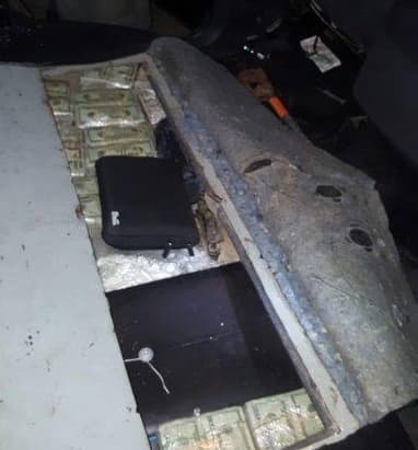 The drug ledgers were allegedly foubd inside this huidden compartment in one of Lopez Sanabria's cars, along with cash and guns. June 6, 2018.