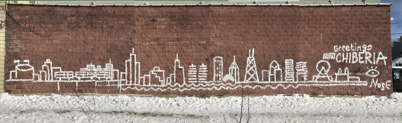 "Greetings Chiberia" dice Eduardo Vea Keating en este mural de la ciudad de Chicago.