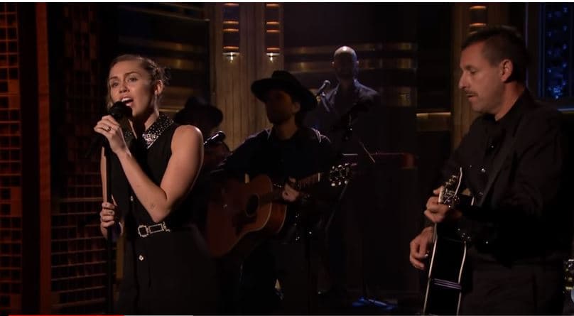 Miley Cyrus and Adam Sandler pay tribute to Vegas victims 