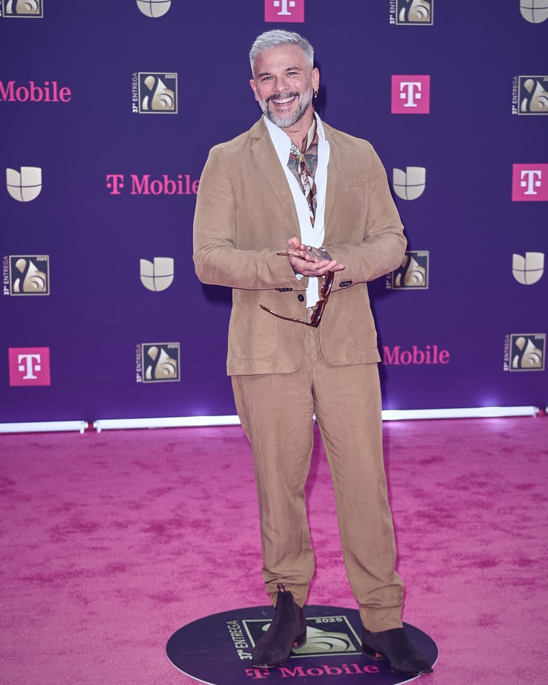 <b>Pedro Capó </b>optó por un traje casual.