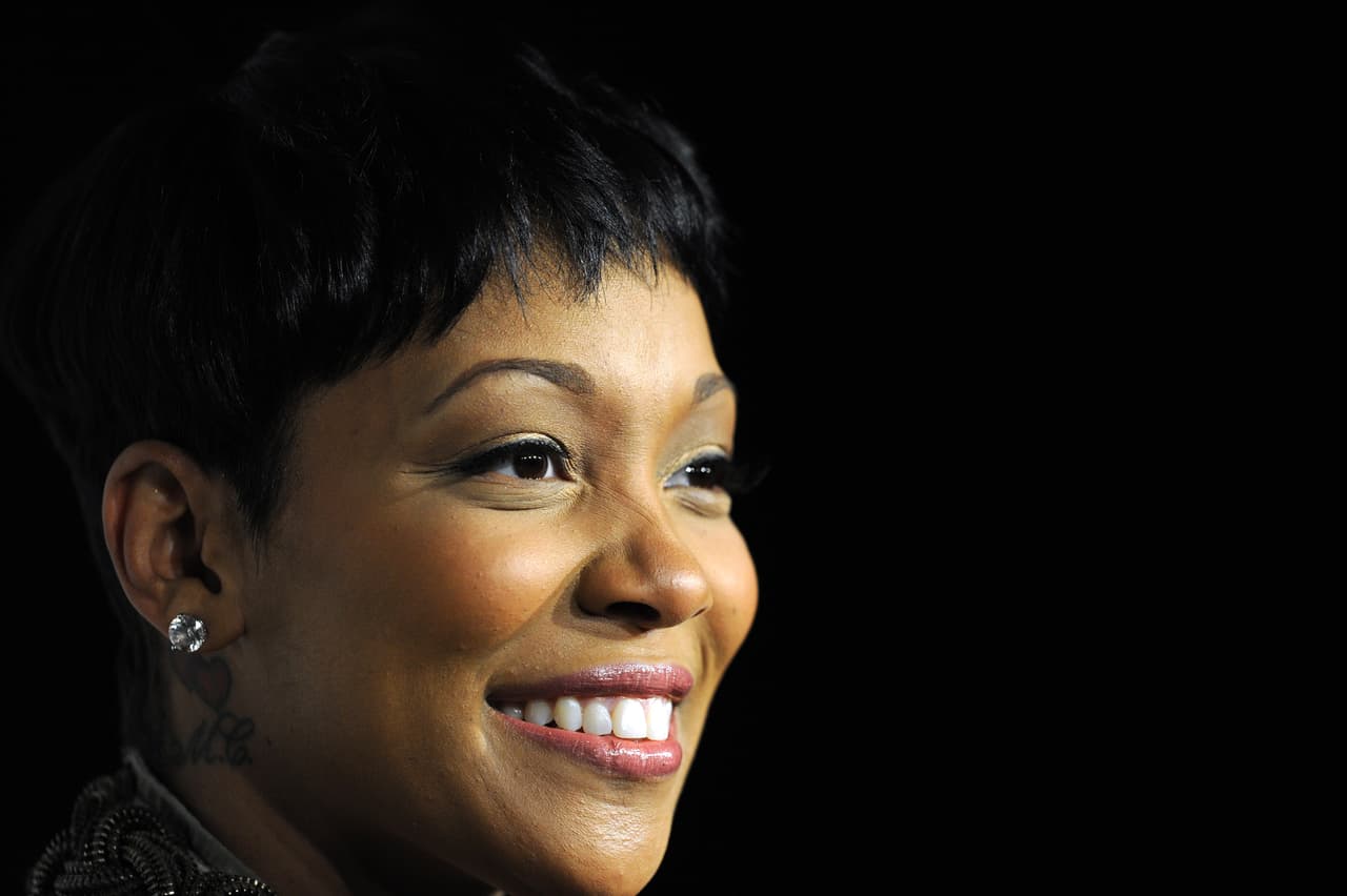 US R&B recording artist and entertainer Monica poses in the press room at the Grammy Nominations Concert, December 1, 2010 at Club Nokia in downtown Los Angeles. The 53rd annual Grammy Awards show will take place in Los Angeles on February 13, 2011. AFP PHOTO GABRIEL BOUYS (Photo credit should read GABRIEL BOUYS/AFP/Getty Images)