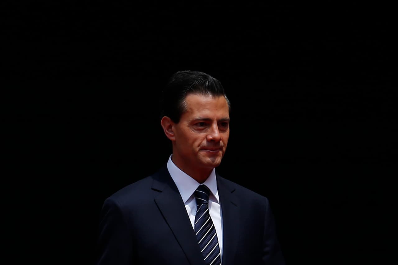 Peña Nieto intenta aplacar las críticas y dice que invitó a Trump para decirle "cara a cara" que no pagará el muro
