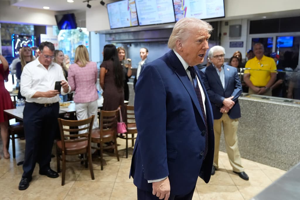 President Donald Trump speaks as he visits Venezuelan restaurant El Arepazo, Monday, March 9, 2026, in Doral, Fla. (AP Photo/Mark Schiefelbein)