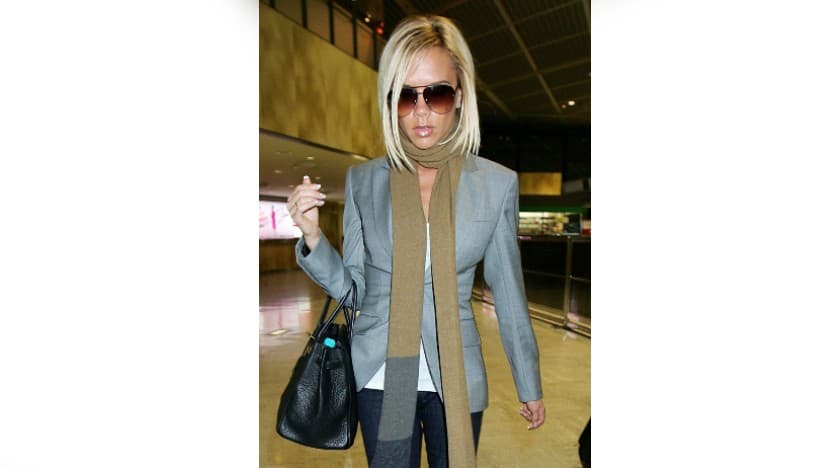 Victoria Beckham en el aeropuerto internacional de Tokio el 27 de septiembre de 2007.