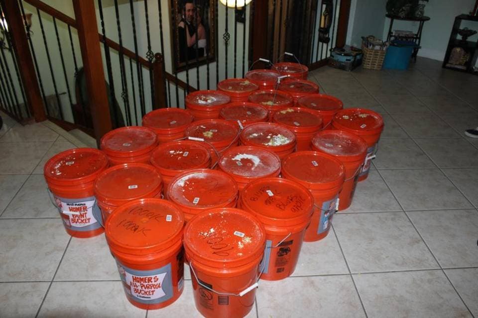 Miami police found the cash hidden in 5-gallon buckets and heat-sealed bags.