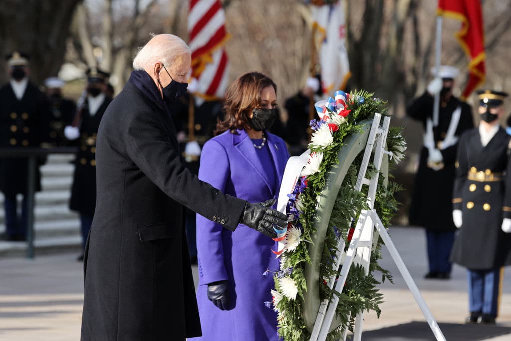 ARLINGTON, VA - JANUARY 20: U.S. President Joe Biden and Vice President Kamala Harris attend a wreath-laying ceremony at Arlington National Cemetery's Tomb of the Unknown Soldier after the 59th Presidential Inauguration ceremony at the U.S. Capitol January 20, 2021 in Arlington, Virginia. During today's inauguration ceremony Joe Biden becomes the 46th president of the United States. (Photo by Chip Somodevilla/Getty Images)