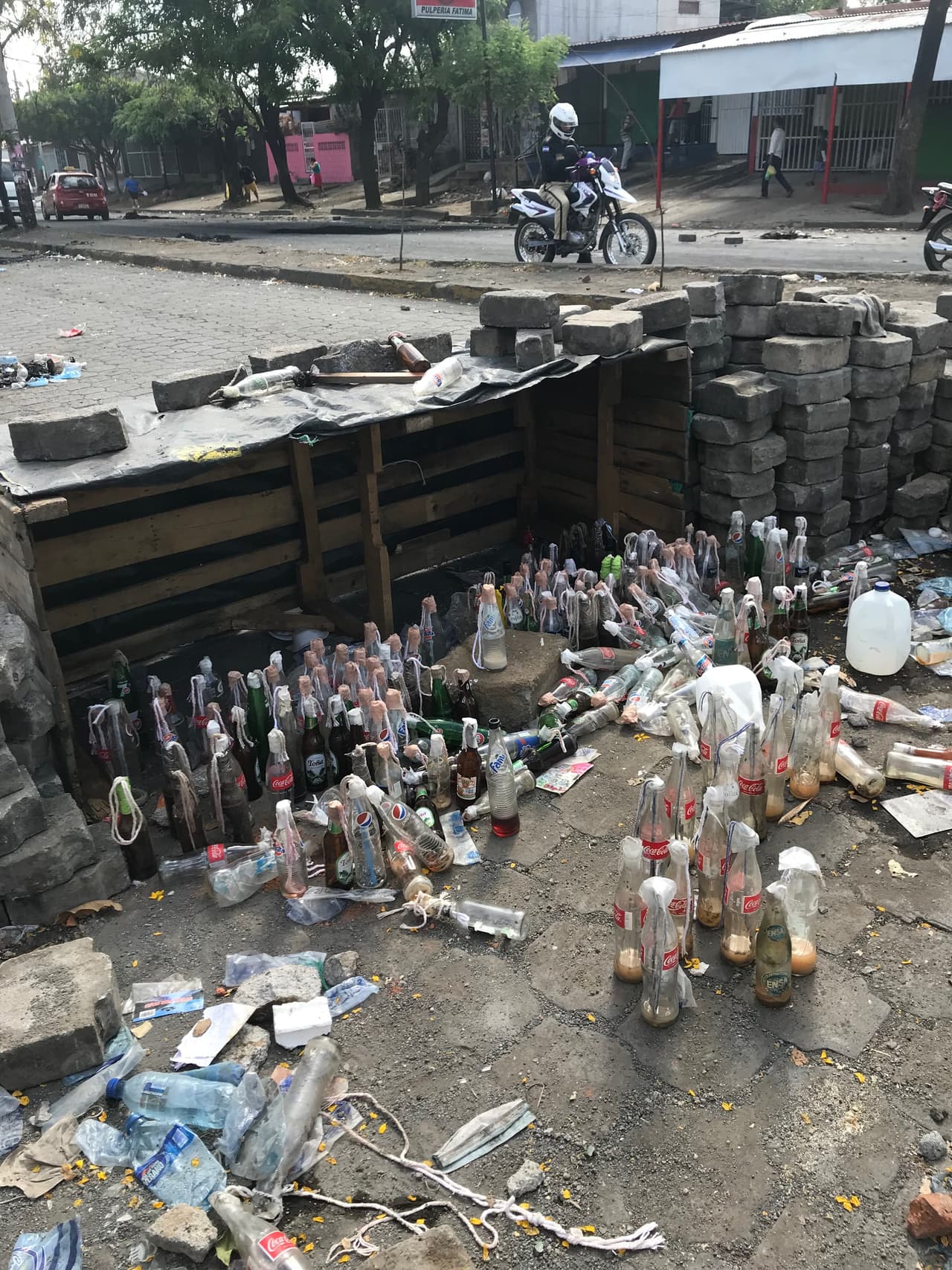 Street barricade with Molotov cocktails in Managua near the Upoli campus.