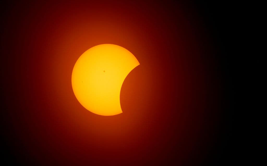 FORT WORTH, TEXAS - APRIL 8: The solar eclipse is seen on April 8, 2024 in Fort Worth, Texas. Millions of people have flocked to areas across North America that are in the "path of totality" in order to experience a total solar eclipse. During the event, the moon will pass in between the sun and the Earth, appearing to block the sun. (Photo by Ron Jenkins/Getty Images)