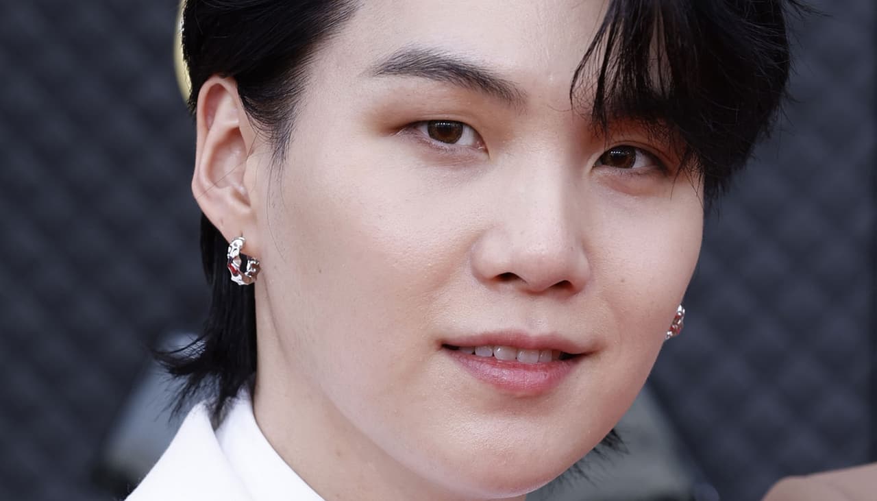 Por que Suga, do BTS, vai passar mais tempo que os outros no exército? 
