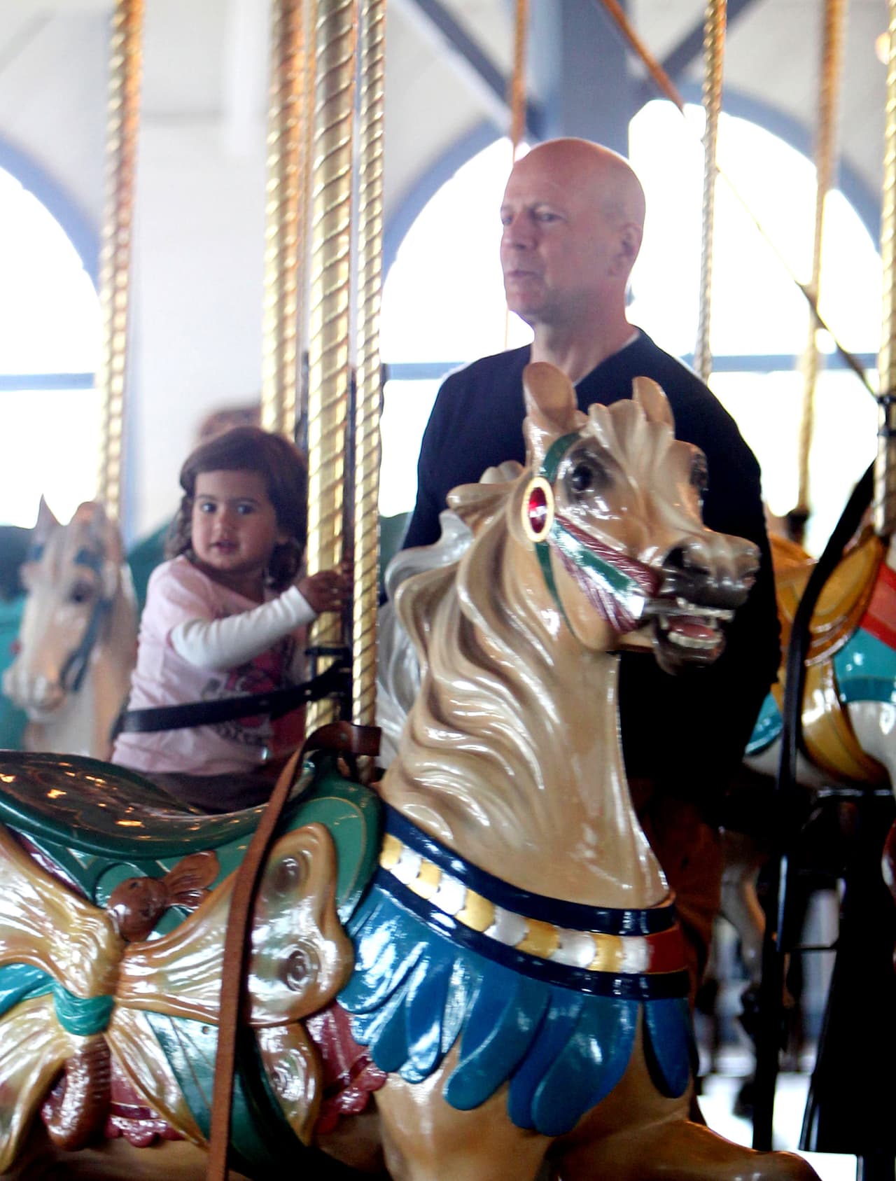 Bruce Willis en su papel de papi consentidor.