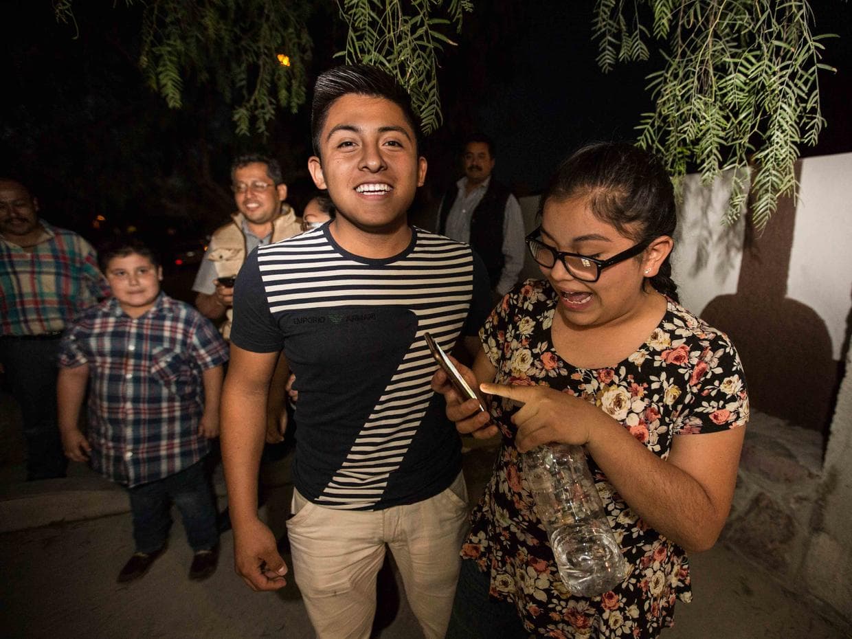 Daniel Muñoz, 17, and his sister Valeria, 16, traveled 14 hours by car to attend Rubi’s birthday party, and capture it on their phones.