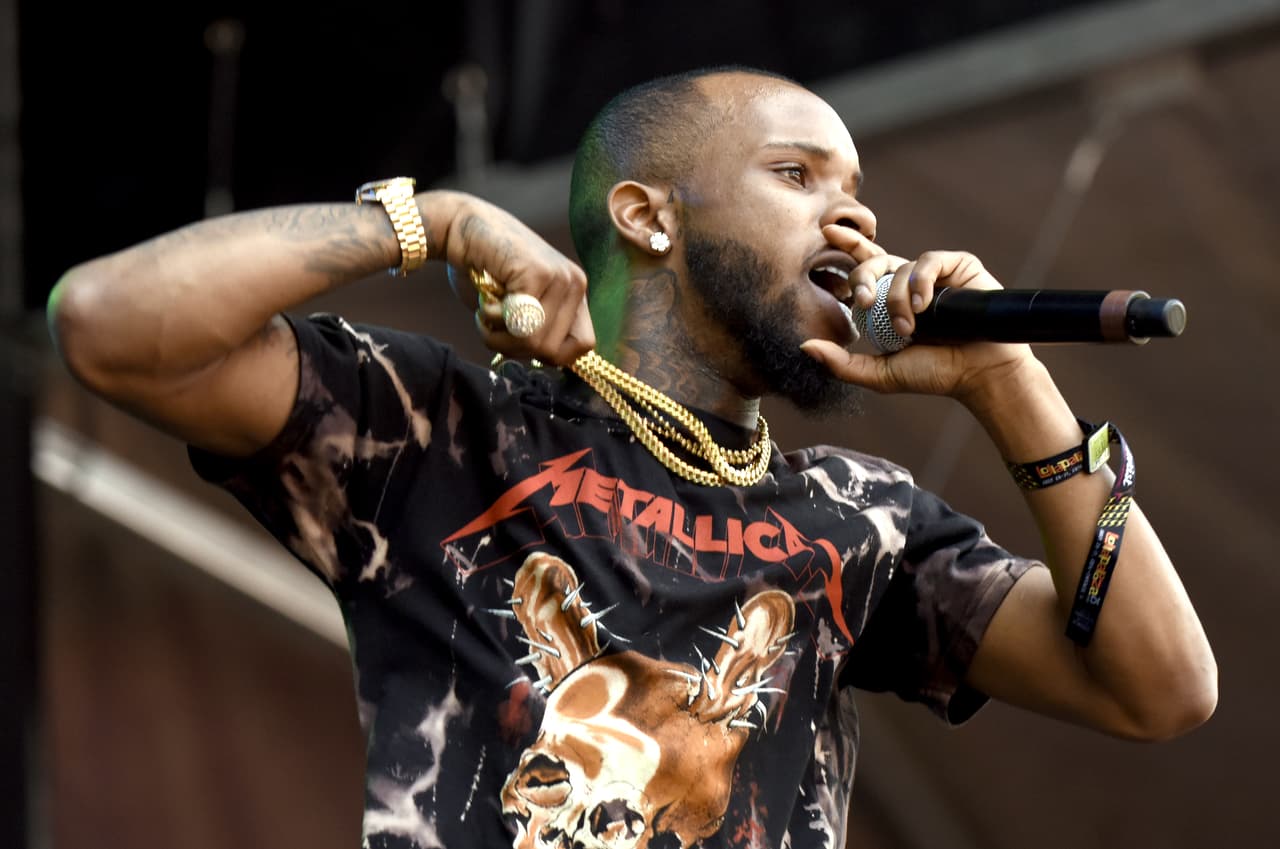 Ambiente del tercer día de conciertos de Lollapalooza 2016. Mira fotos de las actuaciones de Red Hot Chili Peppers y muchas estrellas más. Además del ambiente en el Grant Park.