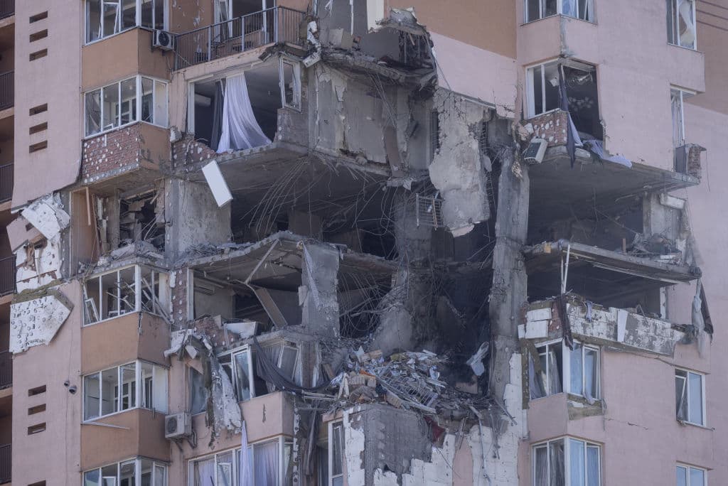 Damage is seen on a large residential tower after it was hit in by a missile on February 26, 2022 in Kyiv, Ukraine. Explosions and gunfire were reported around Kyiv on the second night of Russia's invasion of Ukraine.