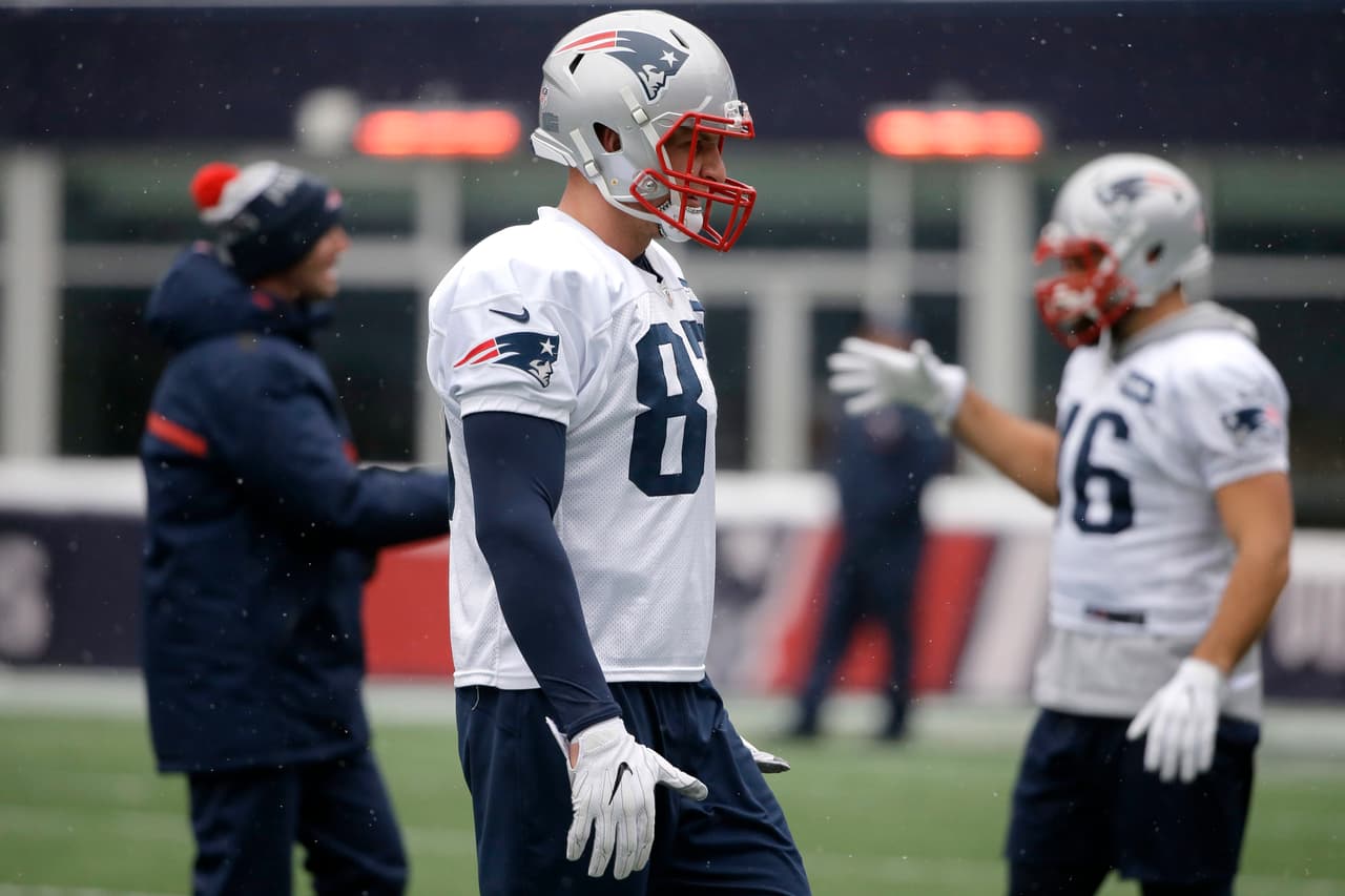 New England Patriots tight end Rob Gronkowski (87) warms up during an NFL football practice, Wednesday, Jan. 17, 2018, at Gillette Stadium, in Foxborough, Mass. (AP Photo/Steven Senne)