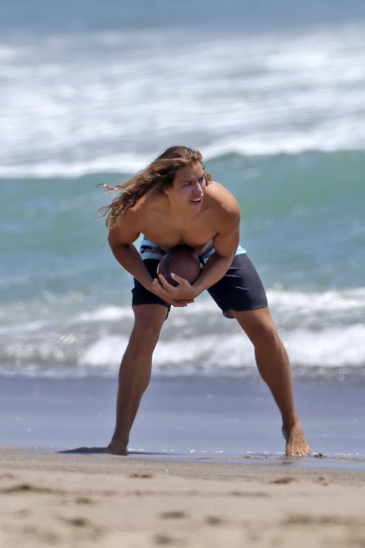 Mira más fotos de Joseph jugando en la playa.