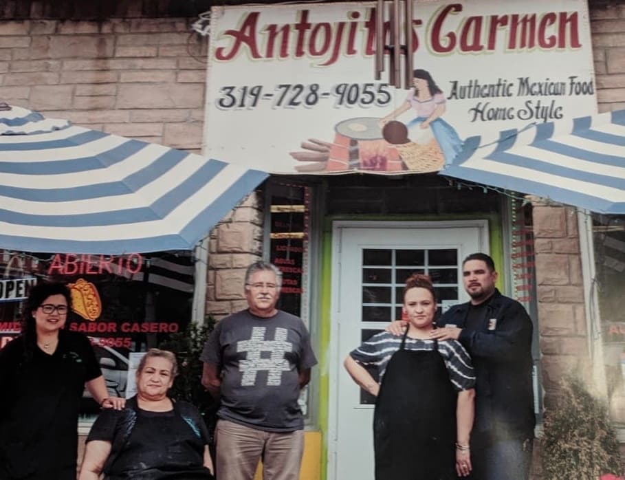 Carmen and Salvador with staff outside Antonjitos Carmen, before the Covid-19 outbreak disrupted their lives.