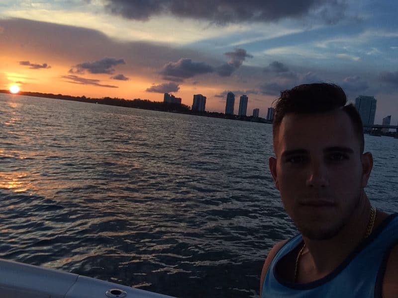 Boating in Biscayne Bay becam,e therapy for José Delfin after his underwent surgery in 2015 on his pitching elbow, which kept him out of the game for a year. Courtesy of the Fernández family/Univision.