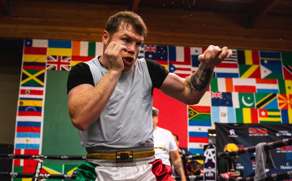 Canelo Alvarez boxes during his media workout at Canelo's Gym on October 20, 2021 in San Diego, California.
