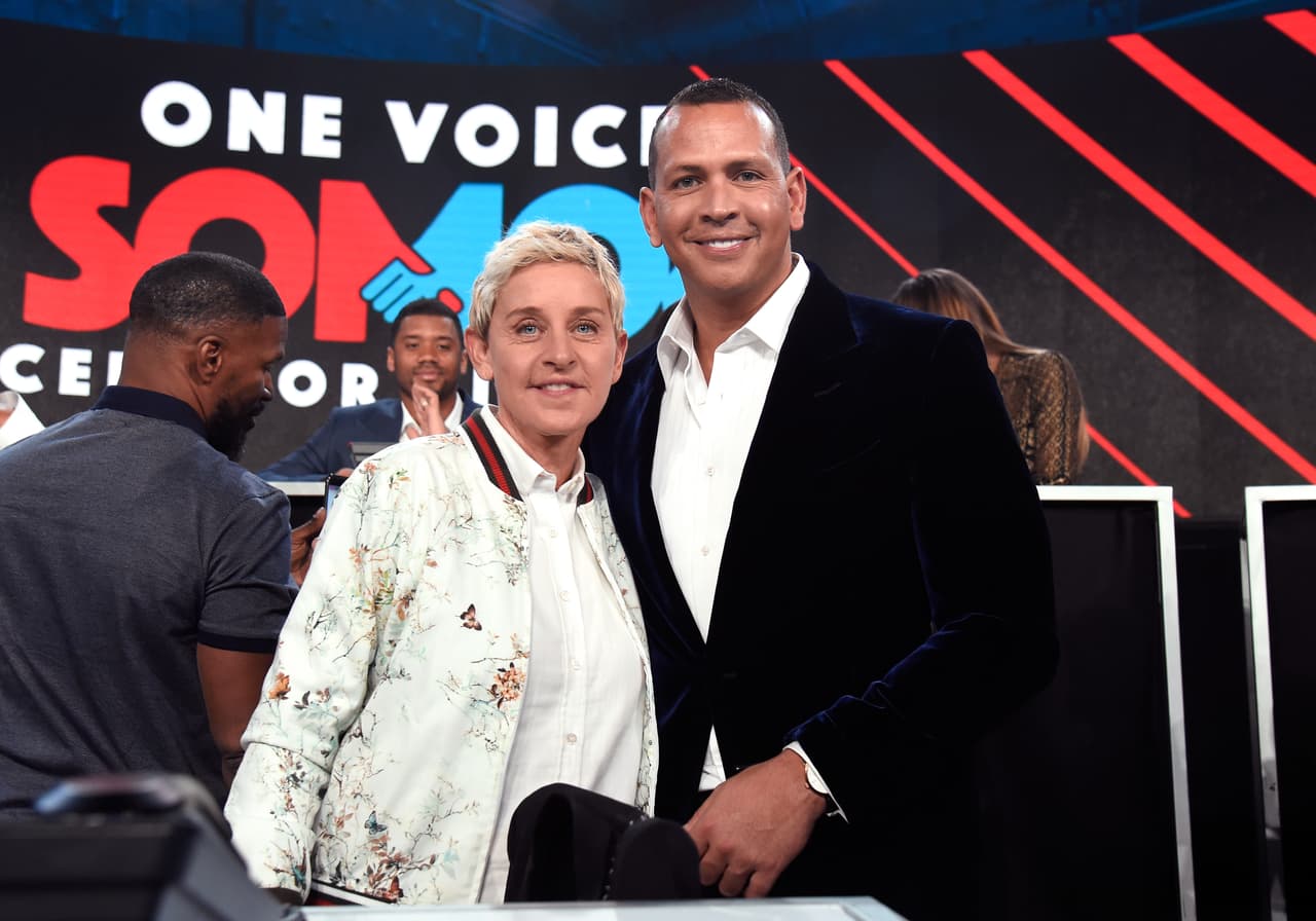 LOS ANGELES, CA - OCTOBER 14: In this handout photo provided by One Voice: Somos Live!, tv personality Ellen DeGeneres and Alex Rodriguez participate in the phone bank onstage during "One Voice: Somos Live! A Concert For Disaster Relief" at the Universal Studios Lot on October 14, 2017 in Los Angeles, California. (Photo by Kevin Mazur/One Voice: Somos Live!/Getty Images)