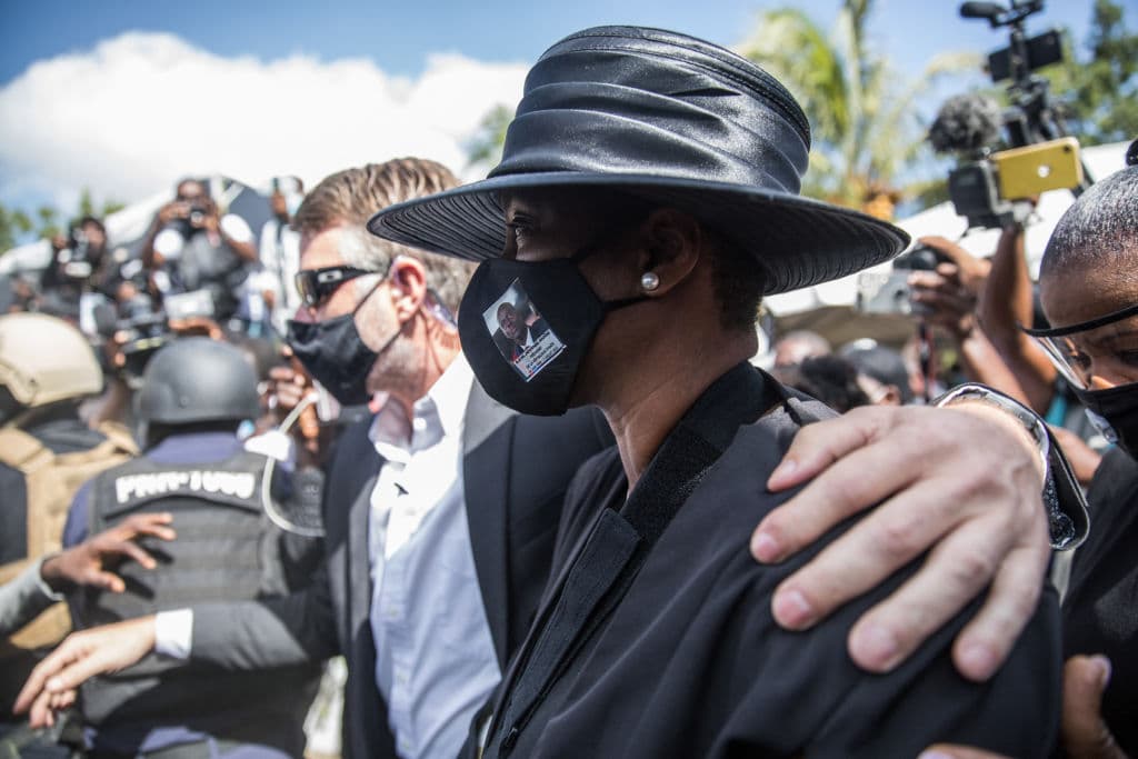 Martine Moïse (C) attends the funeral for her husband, slain Haitian President Jovenel Moïse, on July 23, 2021, in Cap-Haitien, Haiti, the main city in his native northern region.