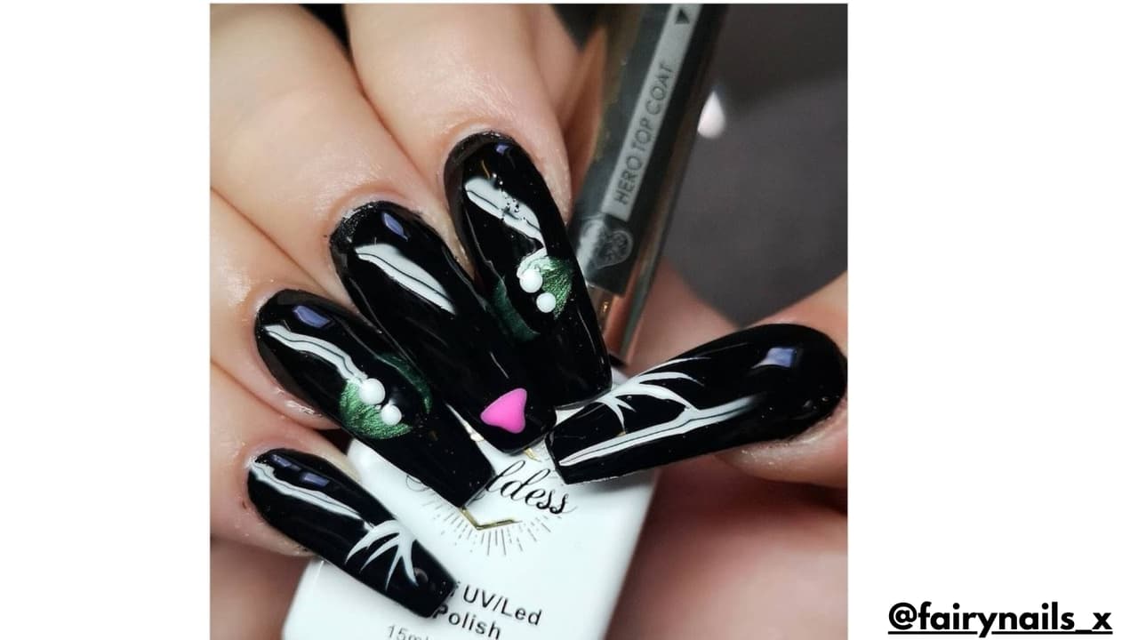 Diseño de uñas ojos de gato para Halloween