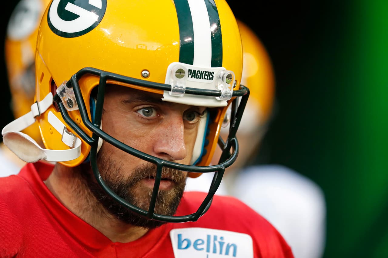 Green Bay Packers Aaron Rodgers steps onto Lambeau Field during an NFL football training camp practice, Saturday, Aug 5, 2017, in Green Bay, Wis. (AP Photo/Matt Ludtke)