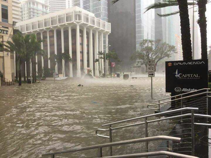 The flood waters began to overflow Brickell Avenue on Sunday as the eye of Hurriacne Irma reached Key West about 150 miles to the southeast.