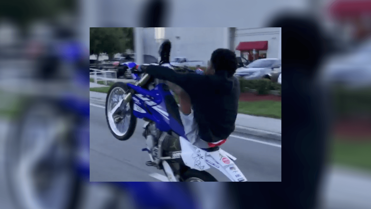 This guy on a dirt bike is doing some crazy tricks