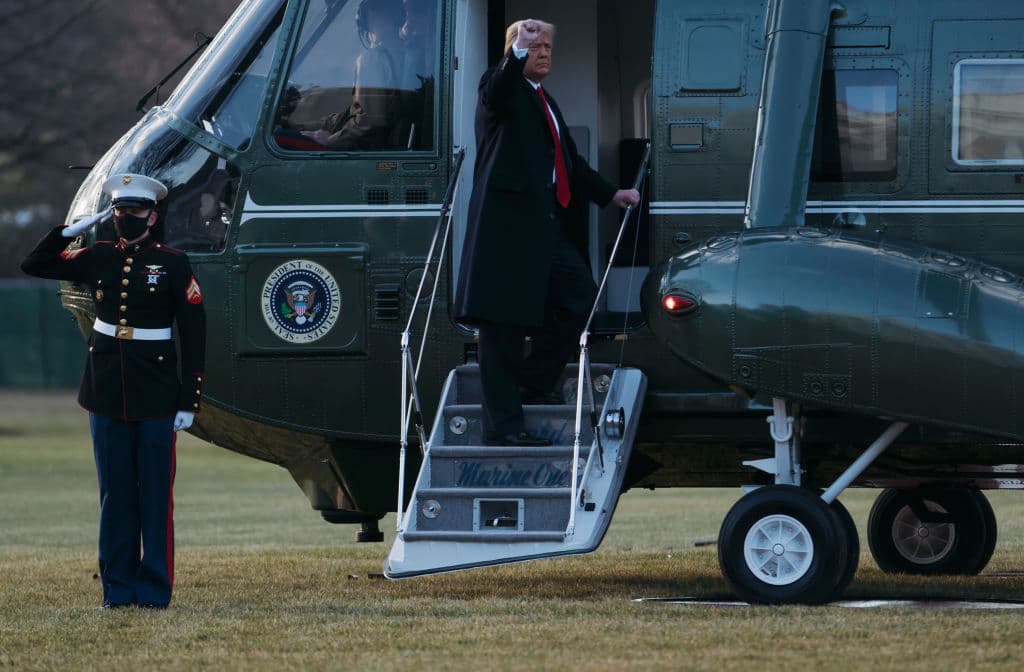 President Donald Trump and first lady Melania Trump board Marine One as they depart the White House on January 20, 2021 in Washington, DC.