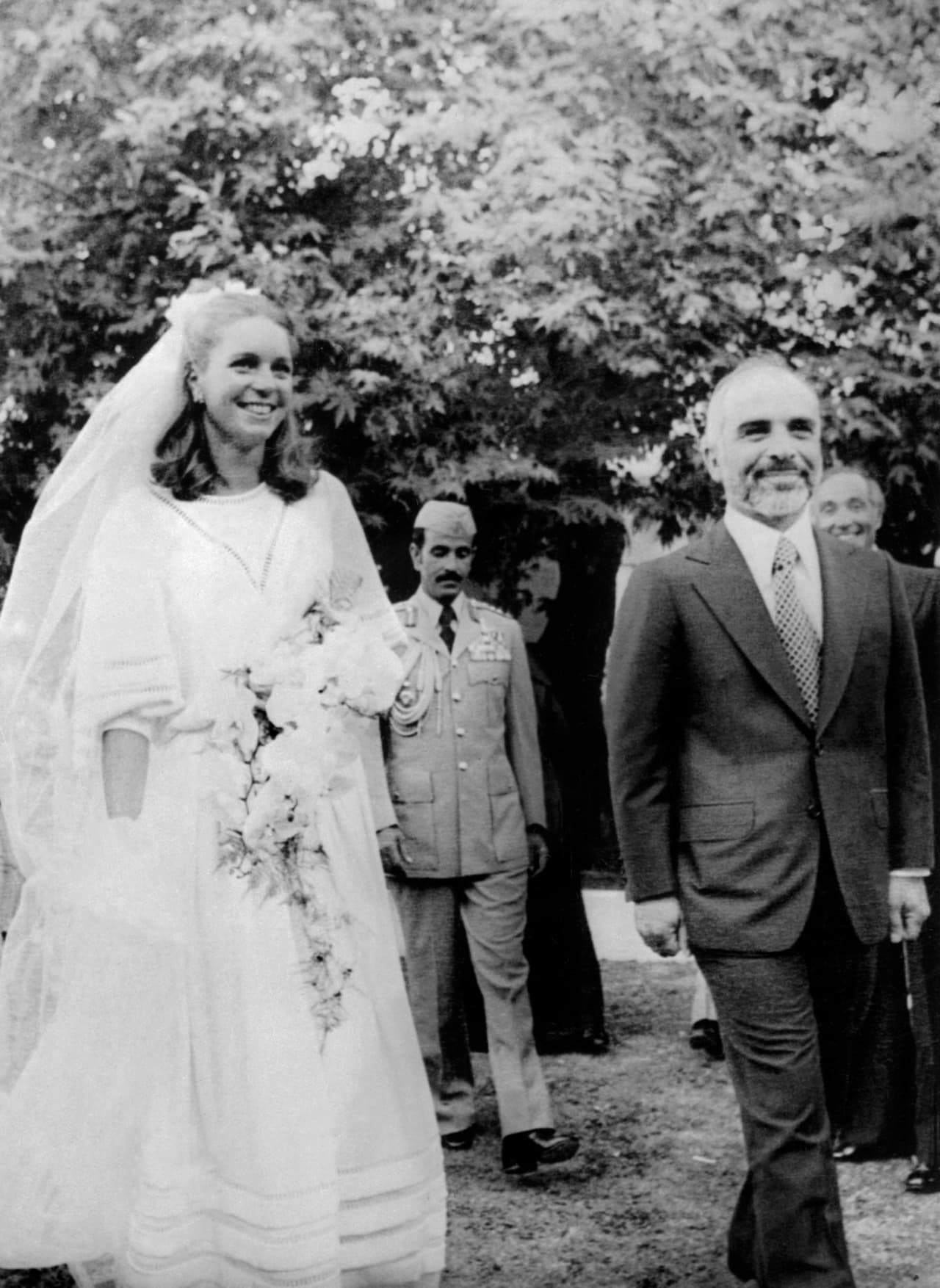 <b>1978 - Queen Noor and King Hussein of Jordan</b>
<br>La 
<a href="https://www.nytimes.com/1978/06/16/archives/hussein-marries-american-and-proclaims-her-queen-no-national.html">US citizen Lisa Halaby</a>, aan architect from the University of Princeton, chose Marc Bohan of Dior to design her gown of white silk and French sleeves, to become Queen Noor.