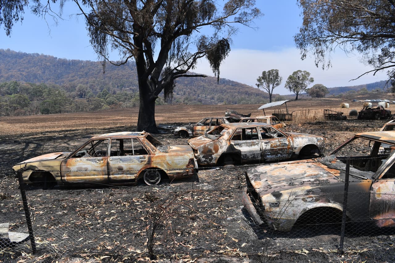 TUMBURUMBA, AUSTRALIA - JANUARY 11: General view of fire damaged cars on January 11, 2020 in Tumburumba, Australia. NSW is bracing for severe fire conditions, with high temperatures and strong winds forecast across the state. There are about 135 fires burning in NSW, 50 of which are uncontained. 20 people have died in the bushfires across Australia in recent weeks, including three volunteer firefighters. About 1995 homes have been destroyed and another 816 have been damaged across NSW. (Photo by Sam Mooy/Getty Images)