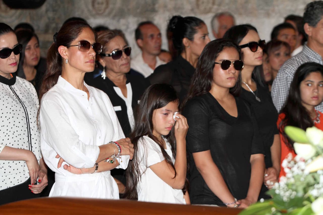 La familia de Joan estaba en las primeras filas. Se les veía desconsolados.