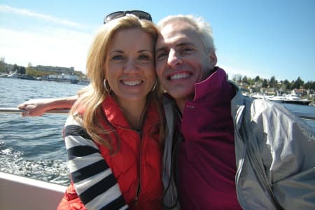 Aaron McQ and his friend Karen Robinson go boating on Seattle’s Portage Bay in 2013, before he fell ill with leukemia and a rare form of ALS, or amyotrophic lateral sclerosis. (Courtesy of Karen Robinson)