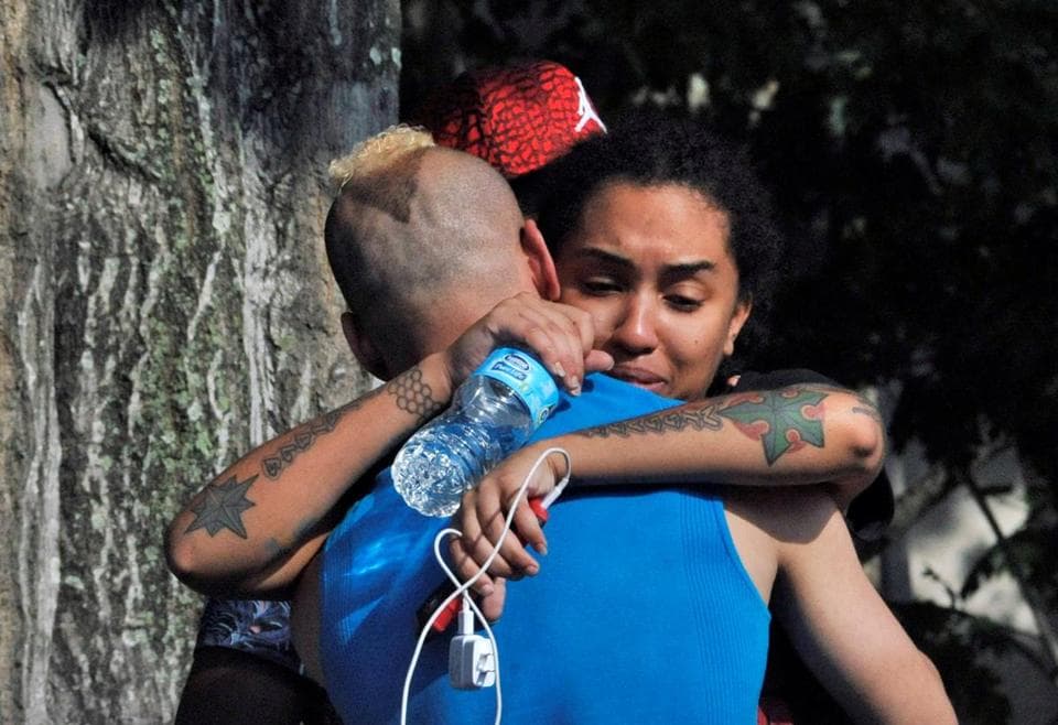Relatives and friends of victims of June 12 gay club shooting outside the Orlando police headquarters.