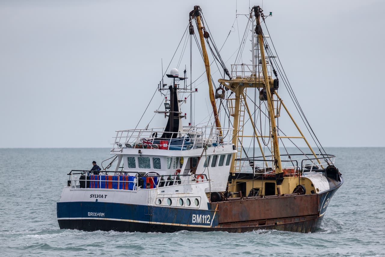 BRIXHAM, ENGLAND - MARCH 03: The fishing trawler Sylvia T heads out to sea after being moored in Brixham harbour on March 3, 2016 in Devon, England. The UK's fishing industry is likely to be radically affected by the outcome of the EU referendum that the UK electorate will vote on June 23. Currently under the EU's Common Fisheries Policies (CFP), quotas are imposed on UK fishermen and it also grants equal access to other European fishing fleets to the UK 200-mile exclusive economic zone around the UK coastline whilst preserving a 12-mile zone for exclusive UK boats. However if the UK votes to leave the UK would regain full control over its 200-mile fishing zone, although bilateral agreement with other fishing nations could require granting access on a quid pro quo basis and there is uncertainty about the potential loss of export markets. (Photo by Matt Cardy/Getty Images)