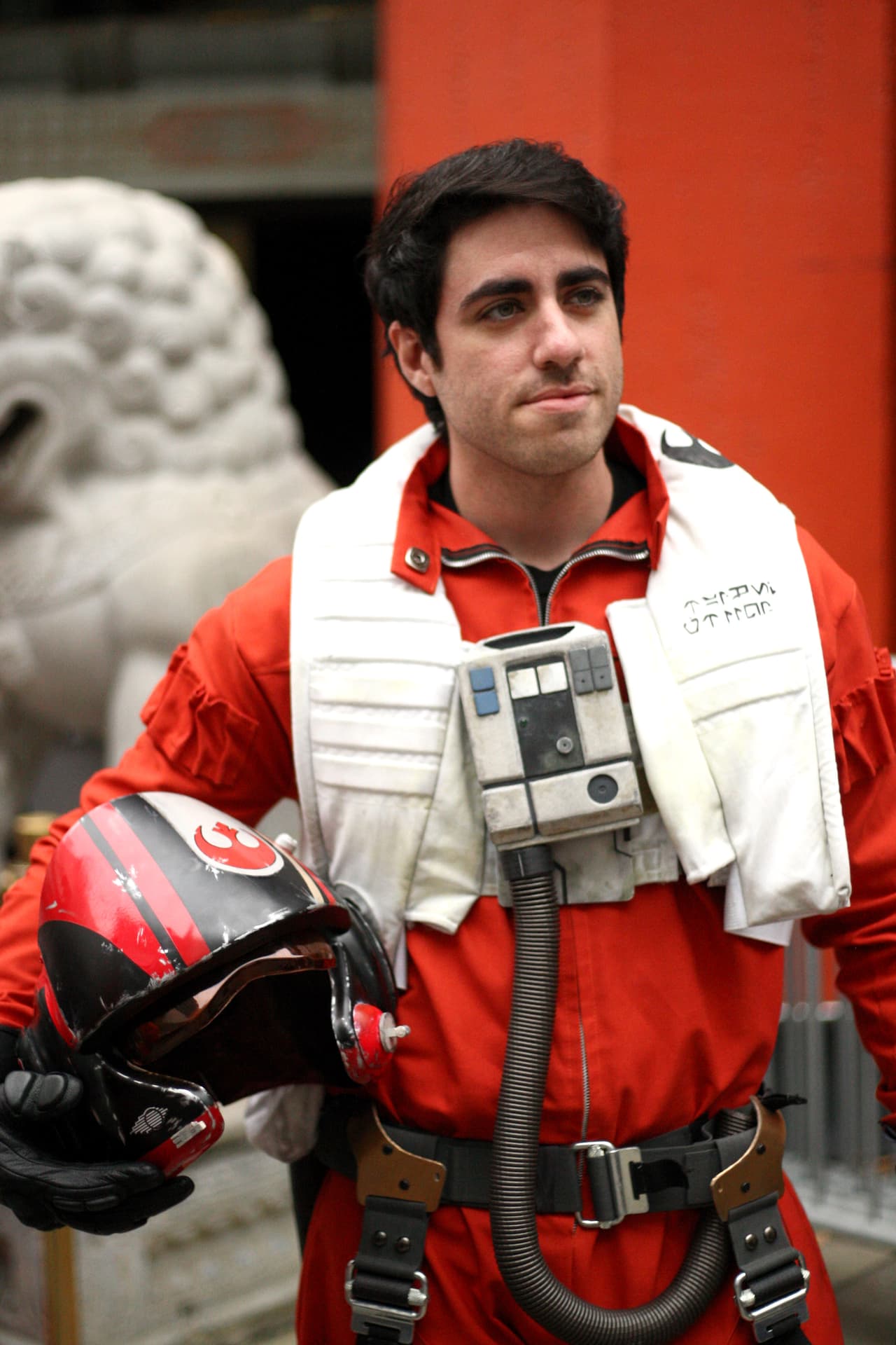 A fan poses for a photo during the costume contest of Star Wars fans lining up to see Star Wars Rogue One: A Star Wars Story at the TCL Chinese Theatre in Hollywood, California, on December 15, 2016. / AFP / TOMMASO BODDI (Photo credit should read TOMMASO BODDI/AFP/Getty Images)