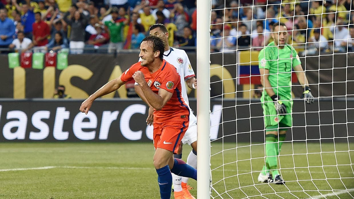 Chile score on a wet night in Chicago to seal place in final v Argentina