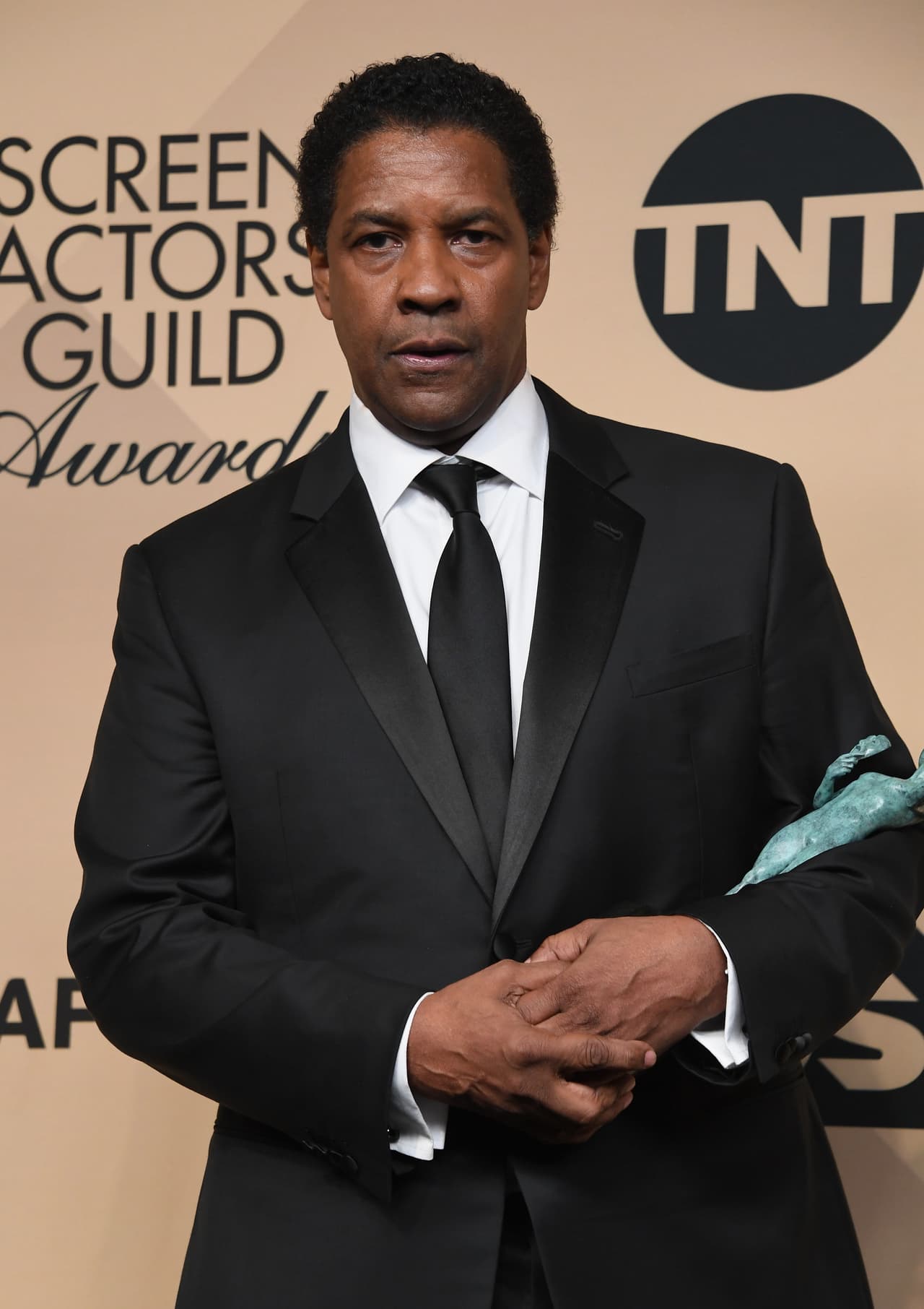 LOS ANGELES, CA - JANUARY 29: Actor Denzel Washington, winner of the Outstanding Performance by a Male Actor in a Leading Role award for 'Fences,' poses in the press room during the 23rd Annual Screen Actors Guild Awards at The Shrine Expo Hall on January 29, 2017 in Los Angeles, California. (Photo by Alberto E. Rodriguez/Getty Images)