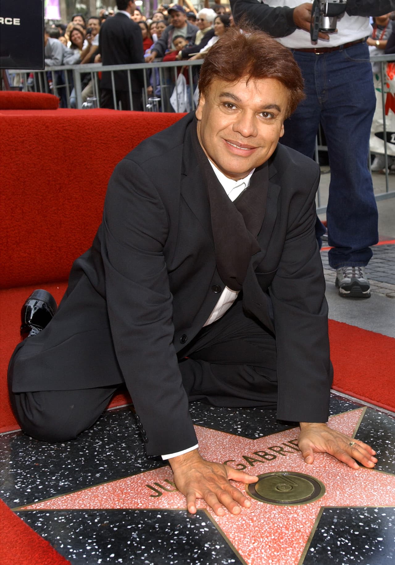 He received his Hollywood star in 2002.