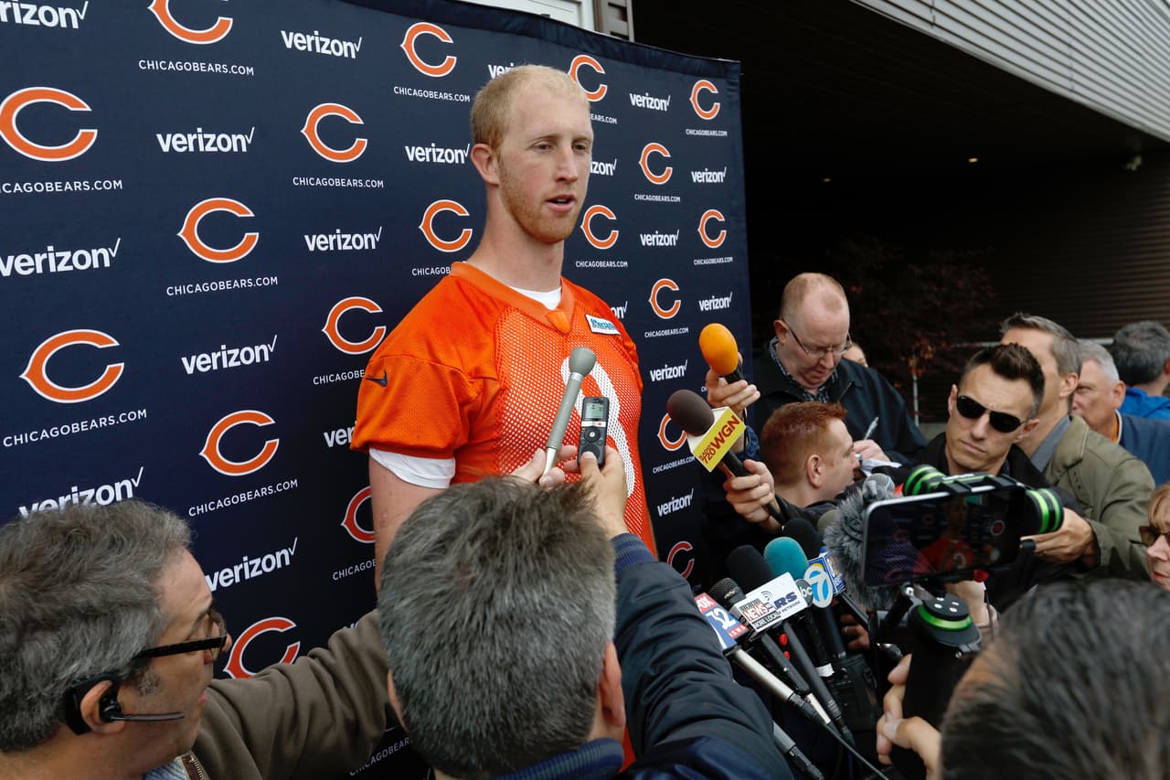 Chicago Bears quarterback Mike Glennon (8) looks on as he talks with members of the media while interviewed after practice drills at Chicago Bears Organized Team Activity (OTA) on Tuesday, May 23, 2017, in Lake Forest, Ill. (Scott Boehm via AP)