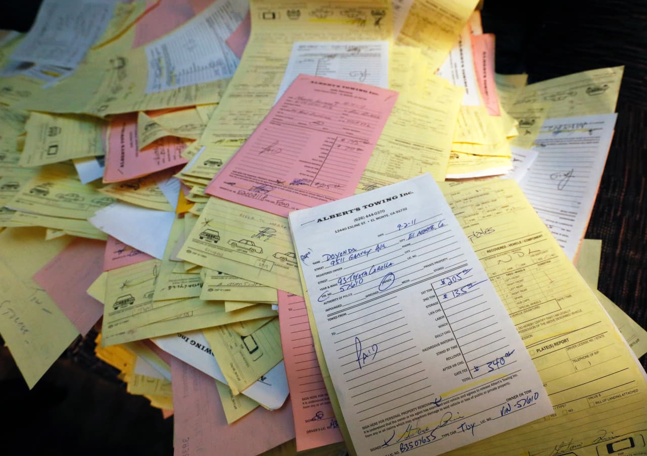 Después de su cierre en 2014, Albert’s Towing dejó cientos de reportes de decomisos de coches.
