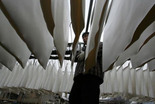 Utilización de prensas y compactadores motorizados de productos de papel.