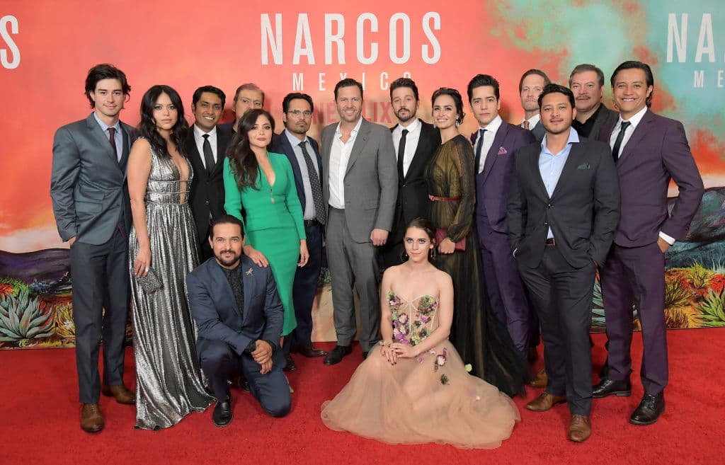 LOS ANGELES, CALIFORNIA - NOVEMBER 14: (L-R) Manuel Masalva, Alyssa Diaz, Alejandro Edda, Tenoch Huerta, Joaquin Cosio, Teresa Ruiz, Michael Pena, Eric Newman, Diego Luna, Tessa Ia, Fernanda Urrejola, Alberto Casablanca, Matt Letscher, Andy Black, Julio Cesar Cedillo, attend the Netflix Original Series "Narcos: Mexico", special screening at LA Live in Los Angeles, CA on November 14, 2018 in Los Angeles, California. (Photo by Charley Gallay/Getty Images for Netflix)
