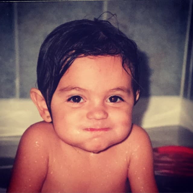 Cuando era una pequeñina tenía unos lindos cachetitos.