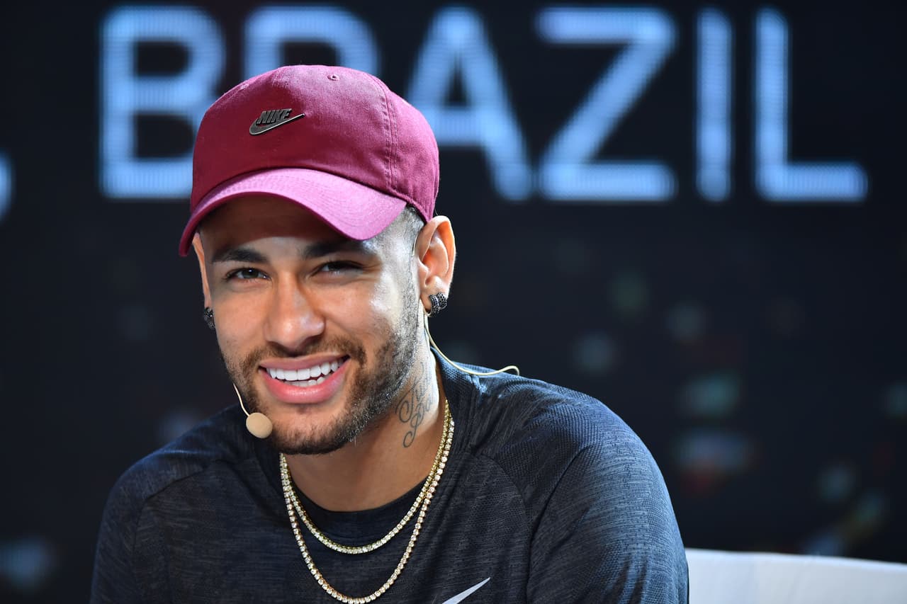Brazilian PSG's footballer Neymar Junior takes part in a promotional event of the Chinese consumer electronic brand TCL for the media, in Sao Paulo, Brazil, on April 17, 2018. Brazilian superstar Neymar said Tuesday that he won't be back playing at least until the second half of May, when he is scheduled to have his final medical exam following foot surgery. / AFP PHOTO / Nelson ALMEIDA (Photo credit should read NELSON ALMEIDA/AFP/Getty Images)
