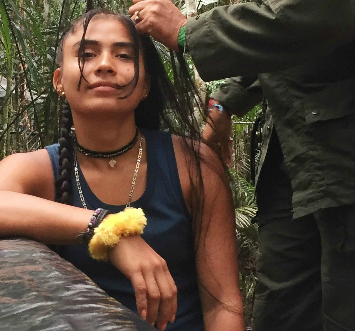 Sirley, a 26-year-old FARC fighter, gets her hair done at a rebel camp in southern Colombia. She joined the FARC aged 13.