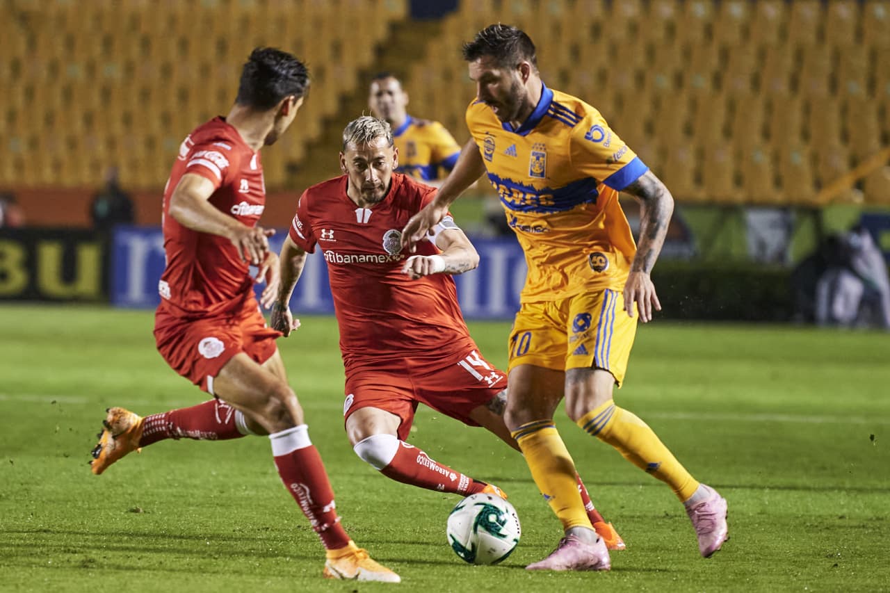 Con doblete de Andre Pierre Gignac, los Tigres sufren de más frente a los Diablos pero aseguran su lugar en la Liguilla del Guard1anes 2020.